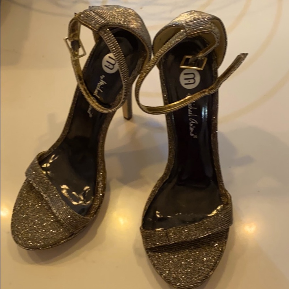 Size 5.5 sparkling metallic 4” heels never worn!